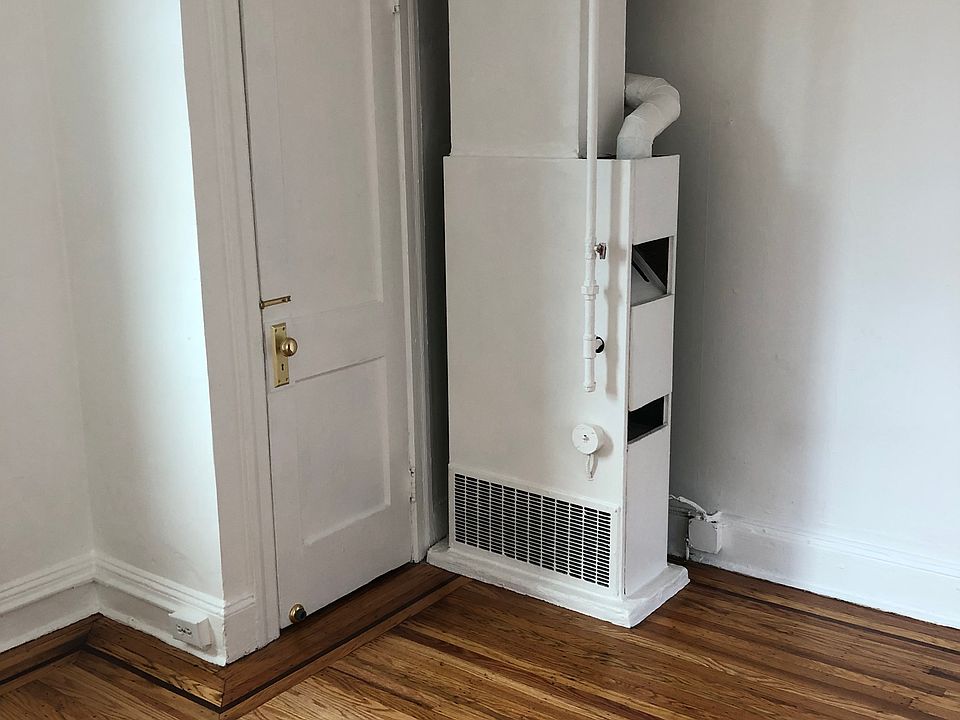Entry Living room with closet and beautiful hard wood floors