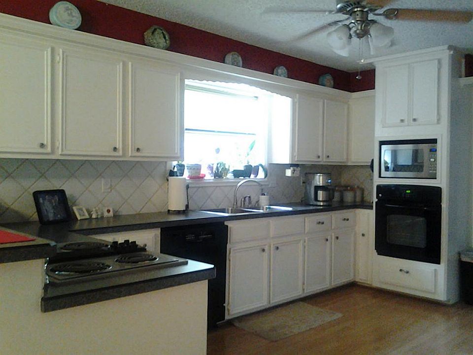 Kitchen with electric JenAir Cooktop