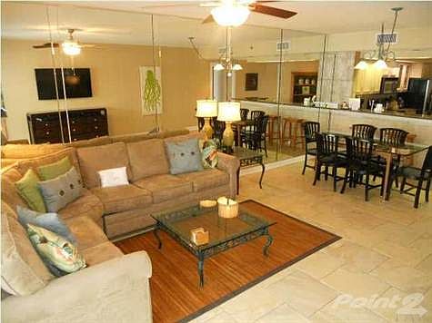 If you like a "roomy feeling" you've got it here. There are full height patio doors in the living room and master bedroom opening onto the patio. And did I mention the wet-bar with icemaker just inside the patio door?