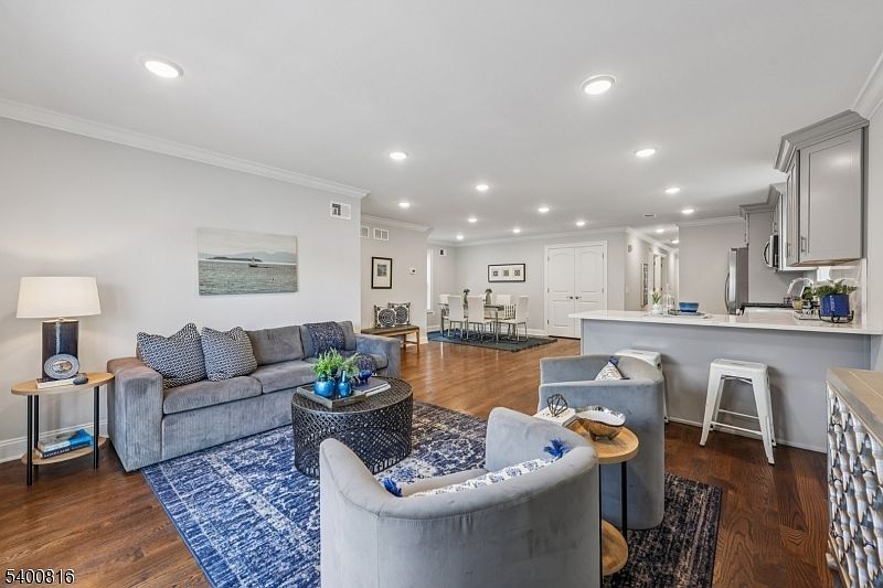 Please note: The apartment is currently not staged. Photos shown are from the first-floor unit and are provided to demonstrate layout, finishes, and design, which are comparable throughout the property.