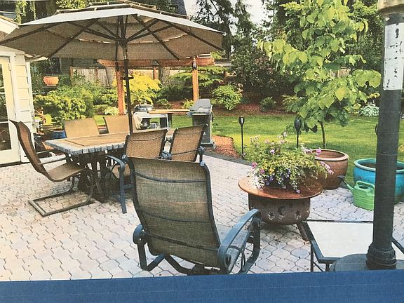 Patio, with furniture, gas and charcoal grills, propane heater and wood fire pit. Great for having friends over.