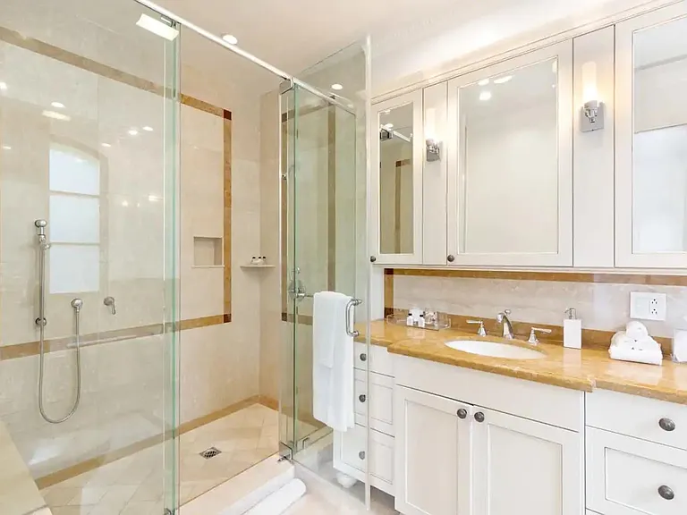 Enjoy a revitalizing shower in the spacious bathroom