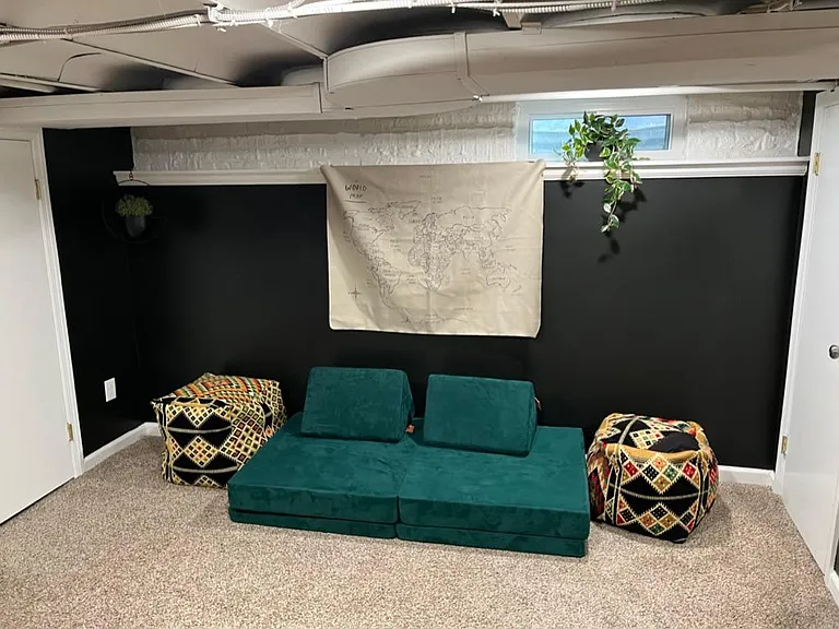 Basement serves as playroom and additional office space.