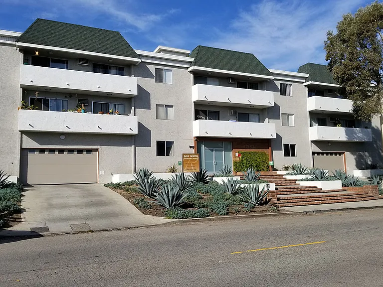 Front view of Rose North Apartments and balconies.
