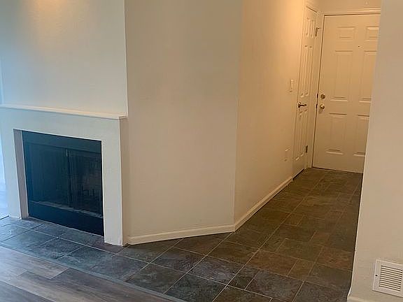 entrance, LR fireplace