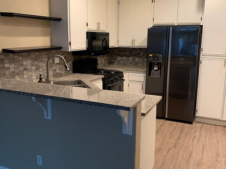 beautiful kitchen with Samsung show case fridge