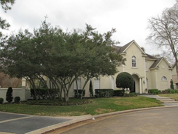 Secluded at the end of the cul-de-sac next to the peaceful Kingwood Trails.