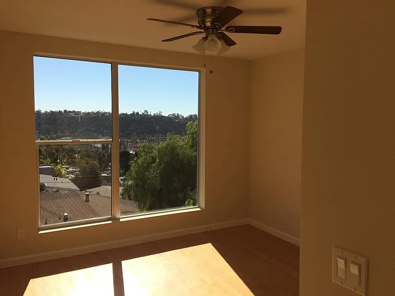 large bay window bringing in natural light and calming green