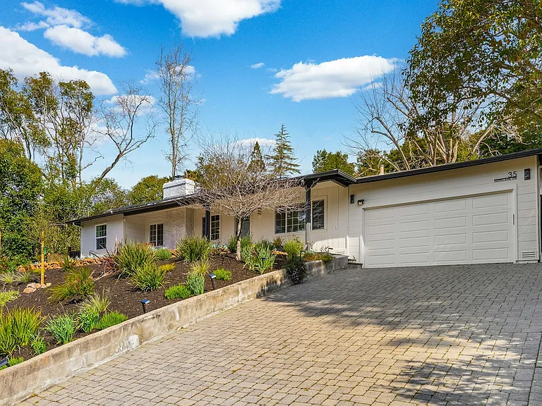 A wide driveway, low-maintenance landscaping, and a welcoming front yard, this home offers curb appeal and plenty of space for everyday convenience.
