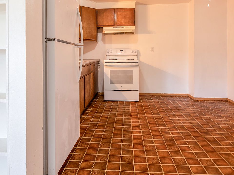 Kitchen complete with stove and fridge