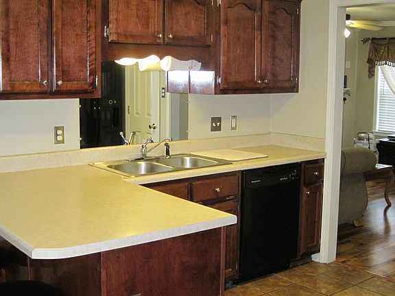 Kitchen area with breakfast bar.