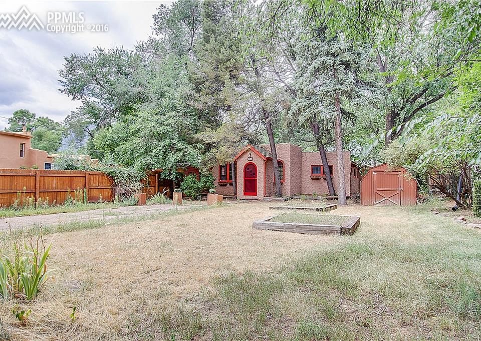 Long treed lot with off street parking and raised garden beds.