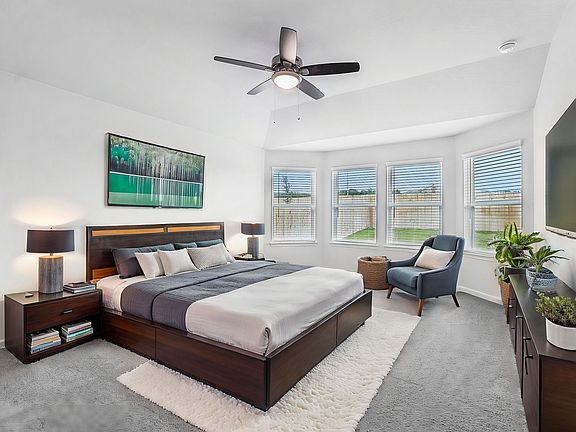 Virtually staged primary suite in the Preston floorplan at a Meritage Homes community.
