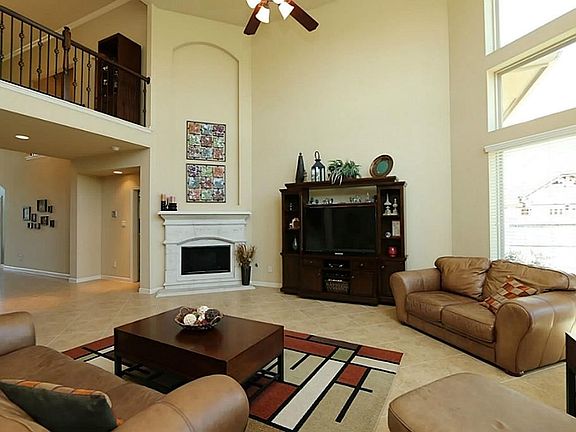 The fireplace and area for the entertainment center is positioned perfectly to make the room very fu