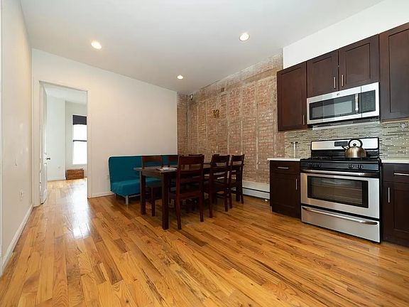 3rd image of 132 Cornelia St #Townhouse