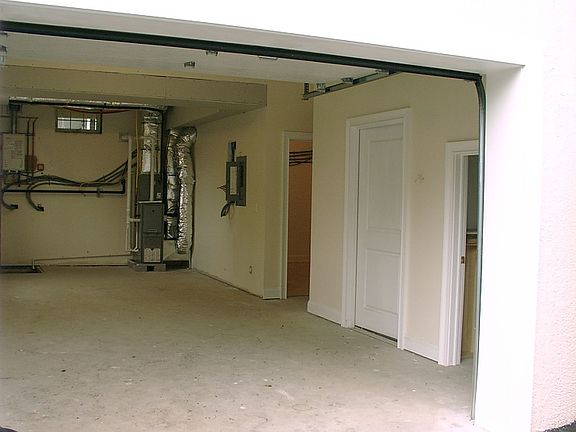Oversized garage with storage room and direct access to home