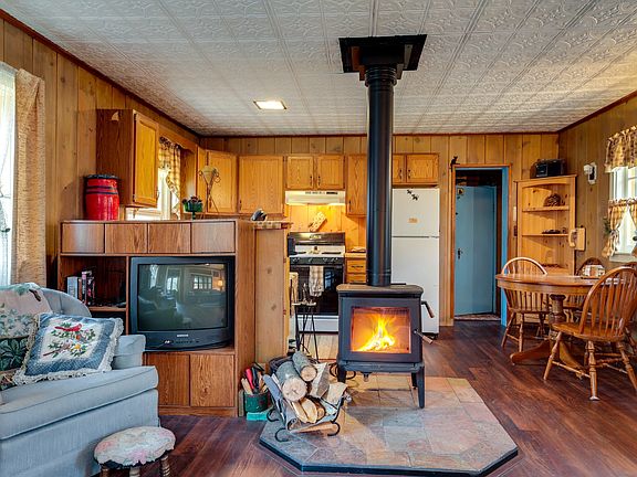 Inside view wood burning stove at Ian's Place Watersmeet Mi Vacation Rental