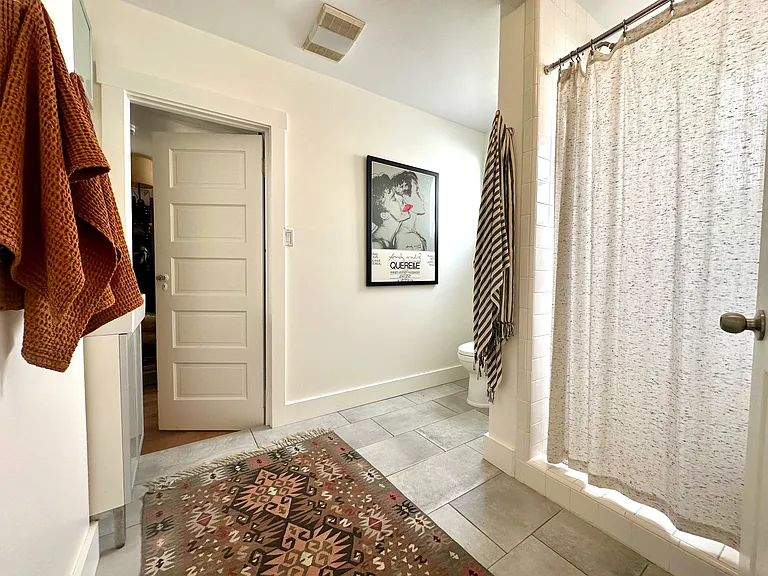 Bathroom - Two Sinks, Shower and Toilet