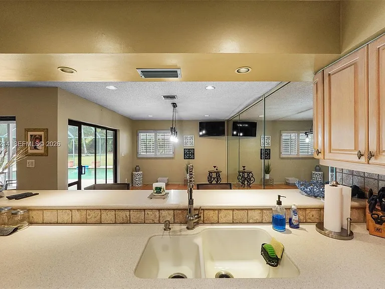 6975 Bianchini Cir — Photo 24