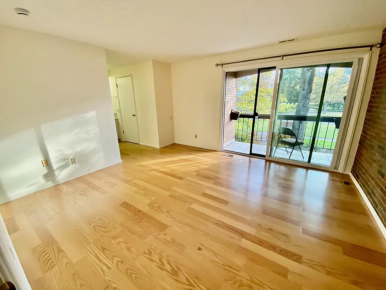 Main Bedroom with private patio, ensuite, walk in closet, and second closet