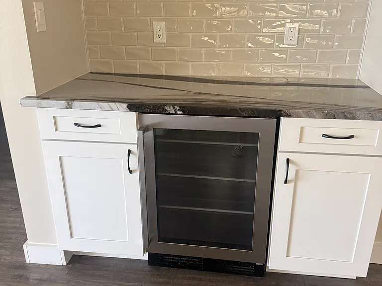 Butlers Pantry with Granite Counters and Beverage center