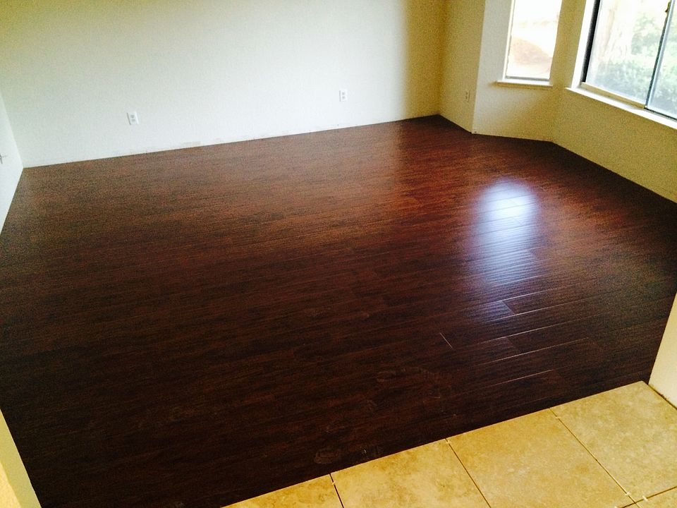 office with new wood flooring and wood blinds