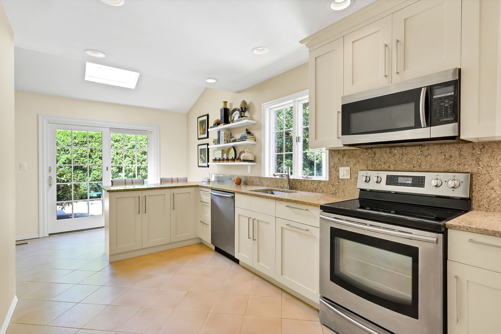 Kitchen with Nice Cabinetry and Quartz Tops
