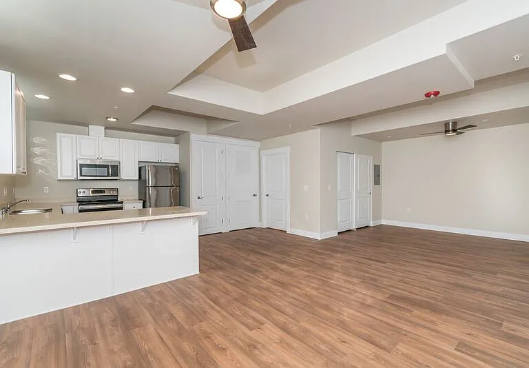 Large studio living with high ceilings