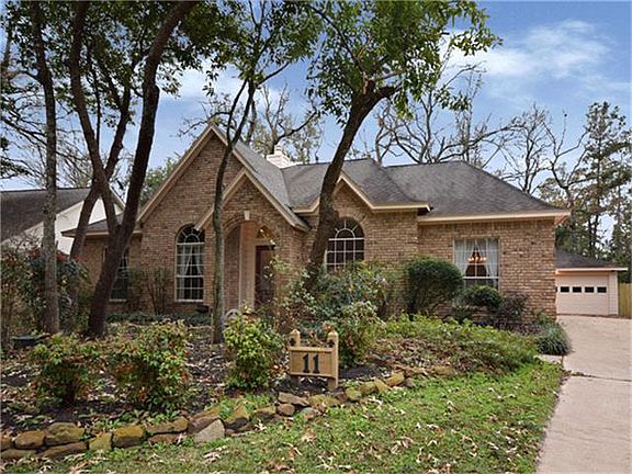 Beautiful breakfast area with windows looking out to backyar