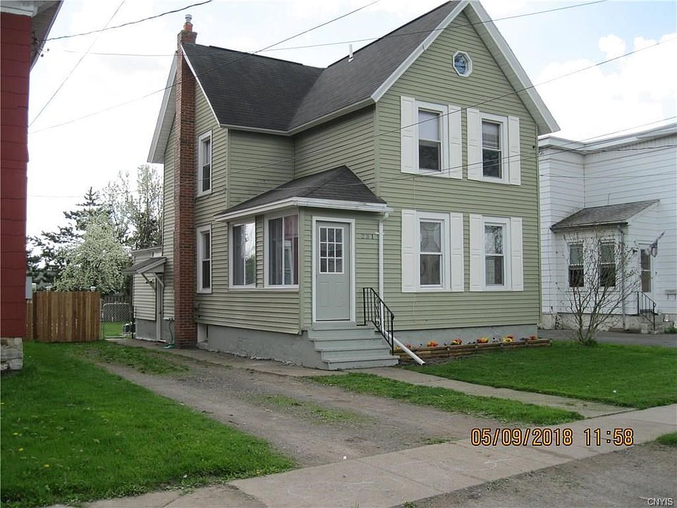 Welcome to 231 West Ellis Street, East Syracuse. Saint Mathews Church located across street