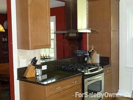 Kitchen
						:
						Completely remodeled in 2009 w/ maple cabinets and stainless range hood