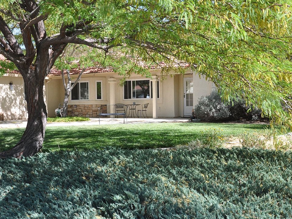 Tree shaded front yard.