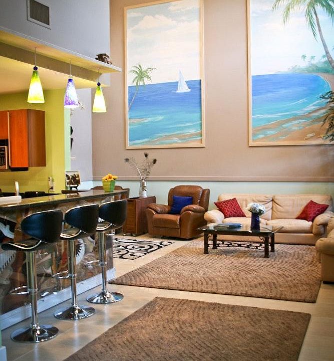 High ceilings, comfortable furniture, and relaxing decor 
