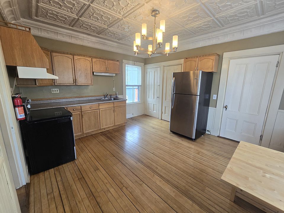 Kitchen with open layout and classic New England details.