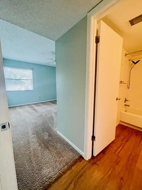 Main Bedroom and Bathroom located inside the walkway to the bedroom. Nice for Privacy when guests are in town.
