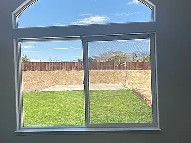 Master Bedroom View of basketball court additional sodded landscape and mountain views