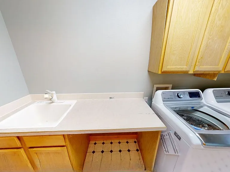 Laundry & mud room accessible through garage