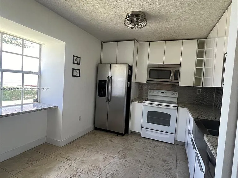 13742 SW 147th Circle Ln #2-27 — Photo 4