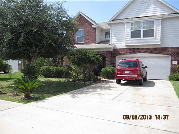 SHADY FRONT YARD WITH BREEZY PORCH