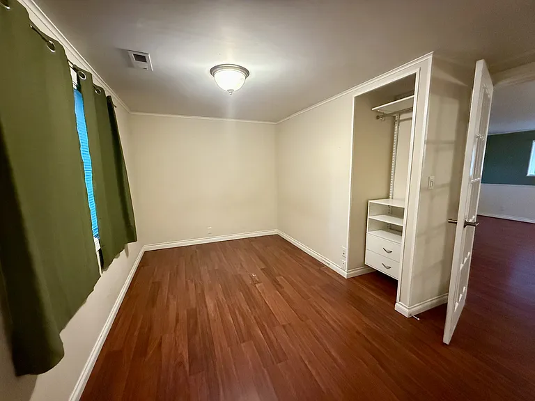 Bedroom or office with French doors to living room
