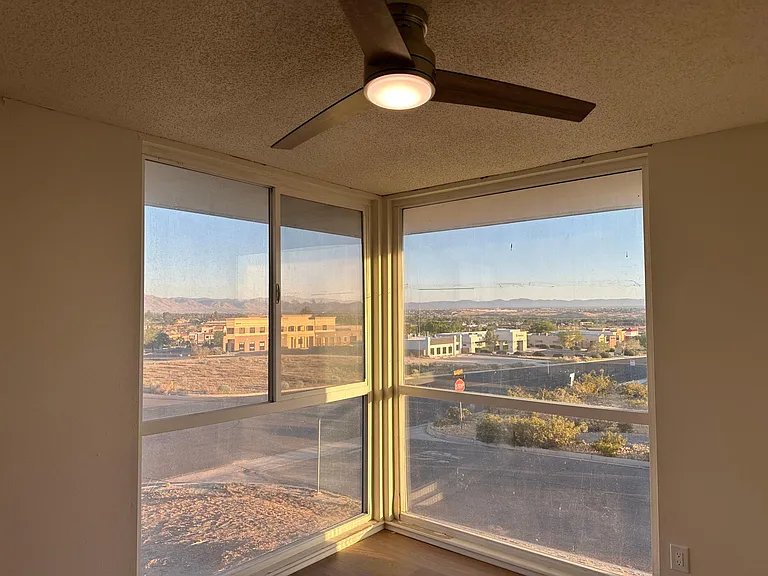 Views of the city and mountains and modern ceiling fan to keep your electrical bills down