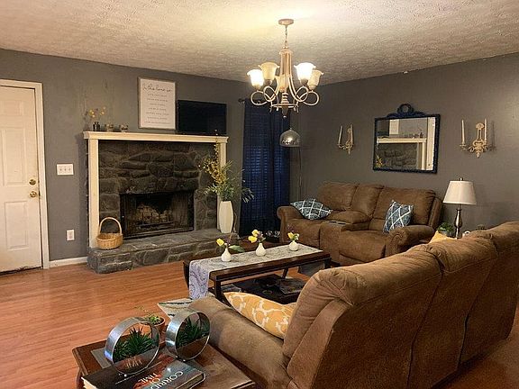 Den and fireplace