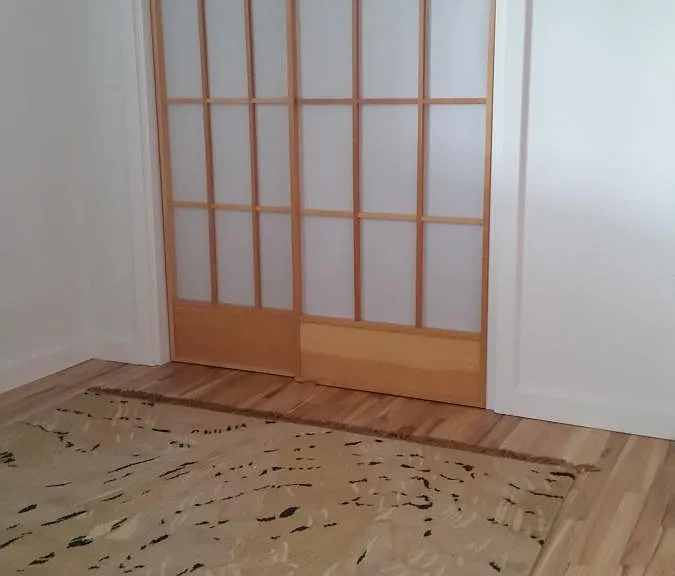 Handwoven Tibetan Rug - Queen bed bedroom