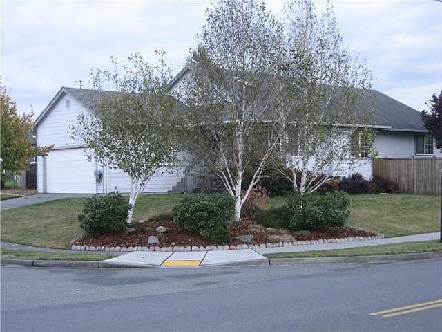 This custom home is close to town with easy access to Anacortes or Oak Harbor