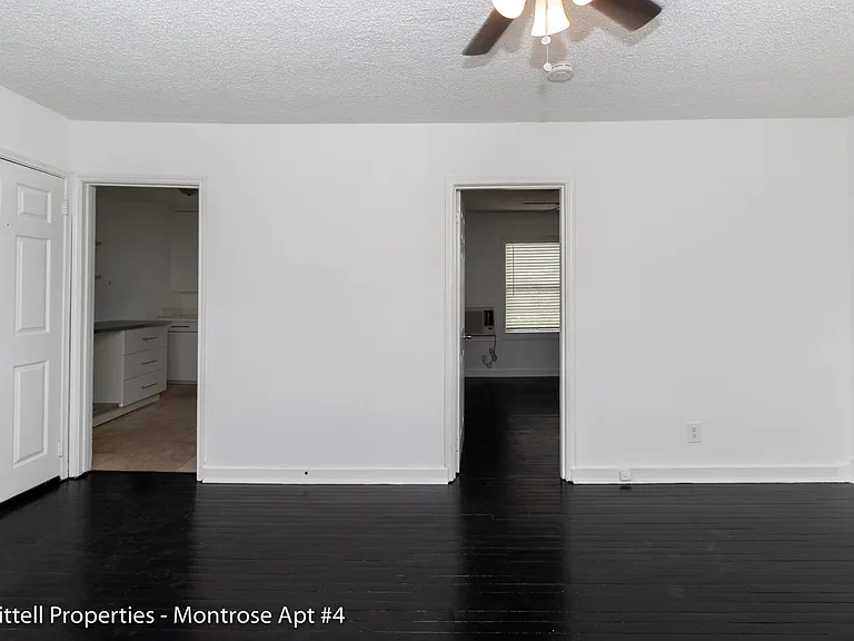 View of entrance to the kitchen and entrance to the bedroom