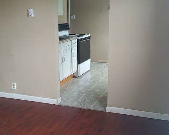 Living room looking into kitchen