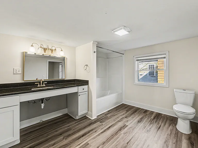 Primary bathroom with shower/tub combo