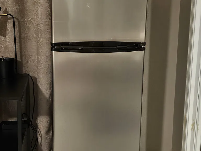 Apartment size refrigerator.