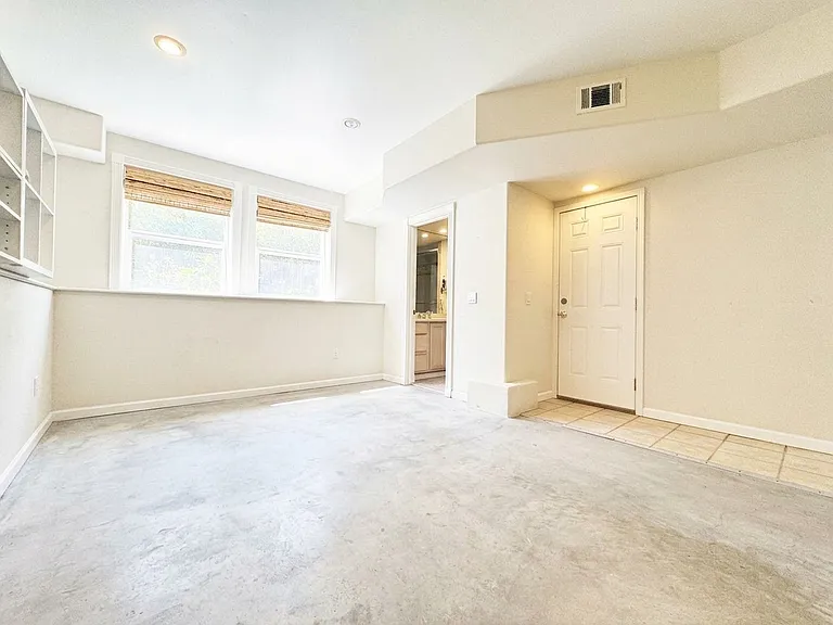 Garden level second master suite with private entry, kitchenette and full bathroom. Can be used as office, guest bedroom, yoga studio, etc.