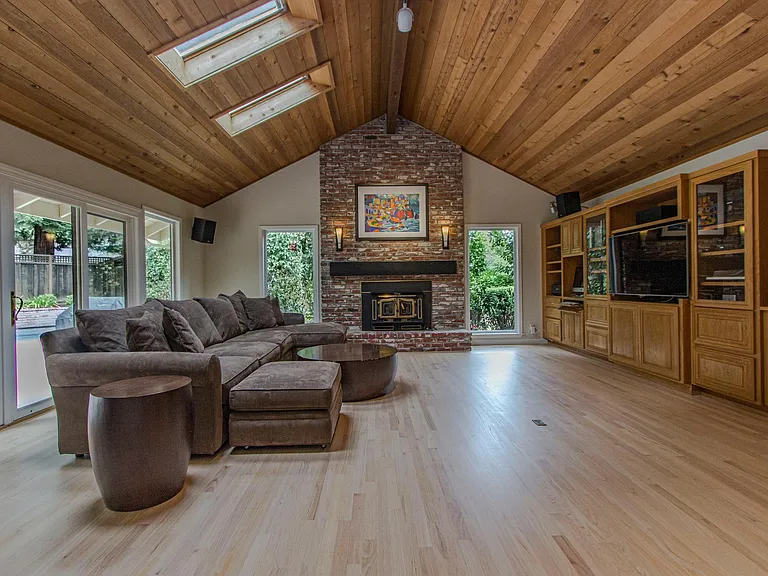 Family Room with fireplace and vaulted ceilings